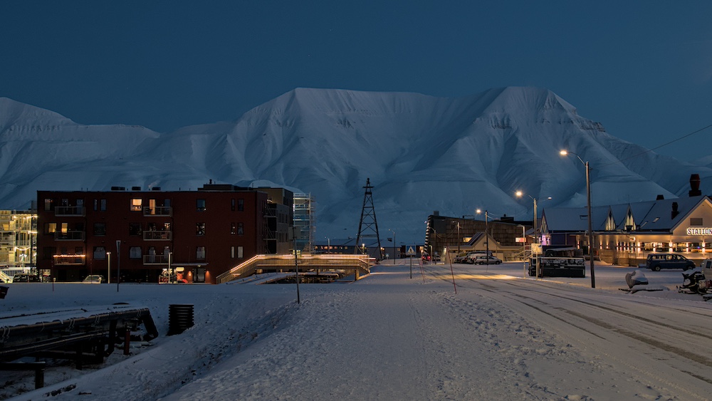 Longyearbyen in October with a view of blue mountains