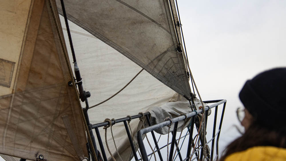 Sails on the hull of the ship SV Meander